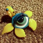 Yellow Finned Glass Turtle Eye Pendant